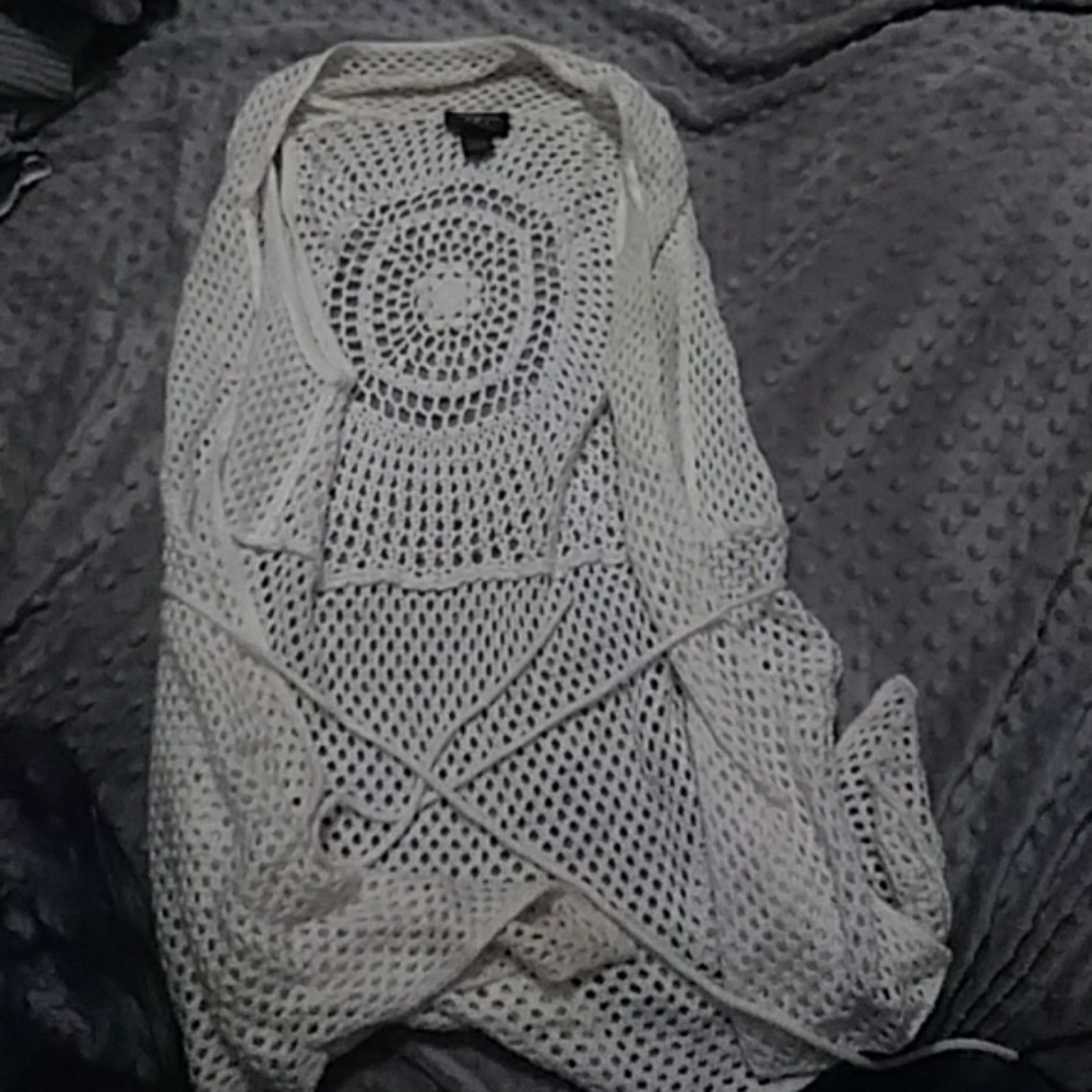 Sleeveless over your clothes top