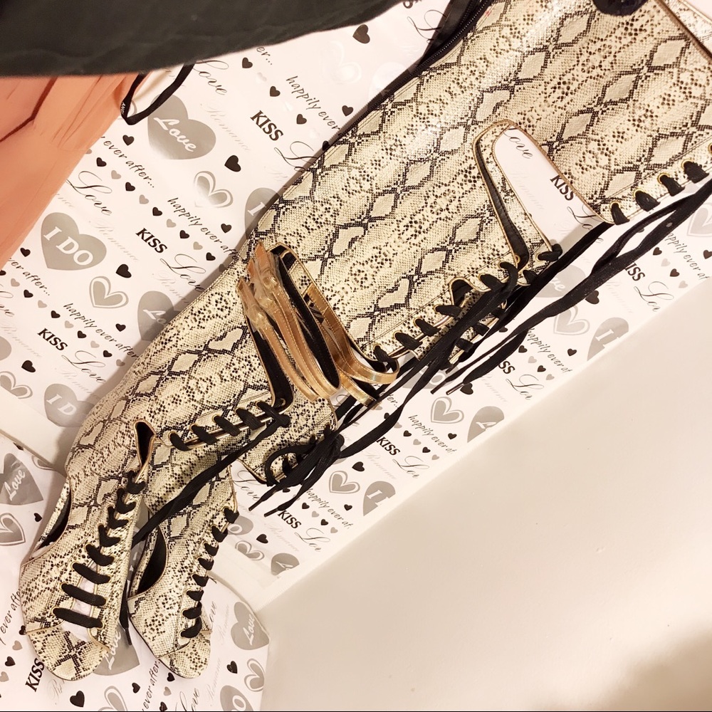 Snake skin tight high boots