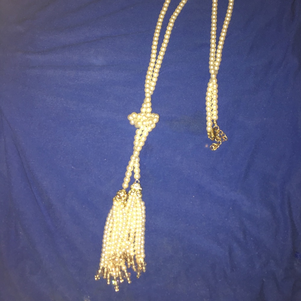Long pearl necklace w/ decorative tassels
