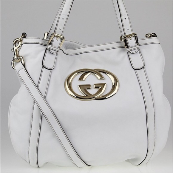 white and gold gucci bag