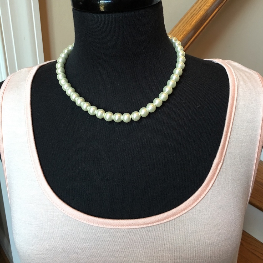 Classy look like Pearl Necklace.