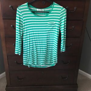 Green and white striped shirt