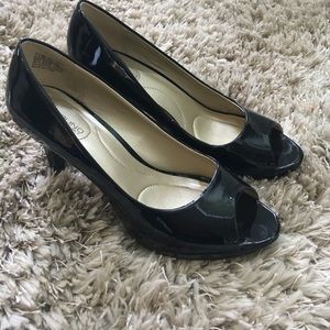 Peep toe black patent leather pumps