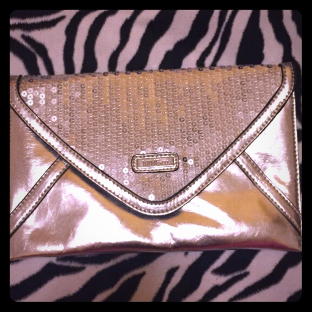 💖Sale💖Shiny Sliver metallic sequin clutch 💖