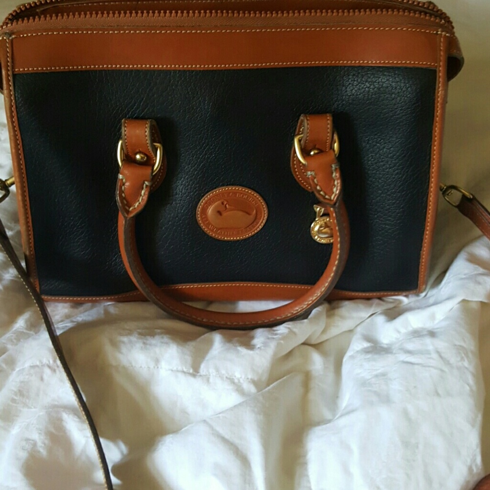 SOLD Dooney and bourke purse "Final markdown"