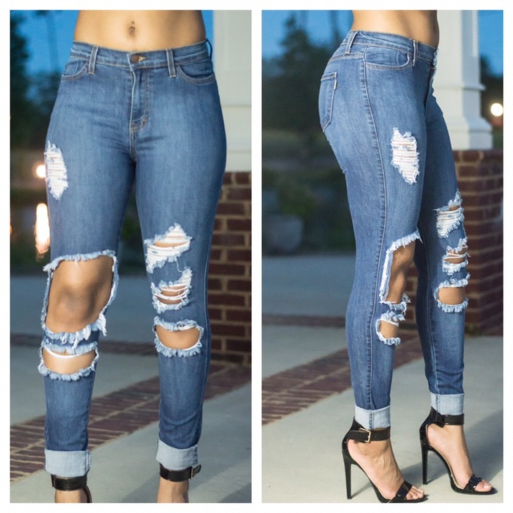 Distressed denim jeans