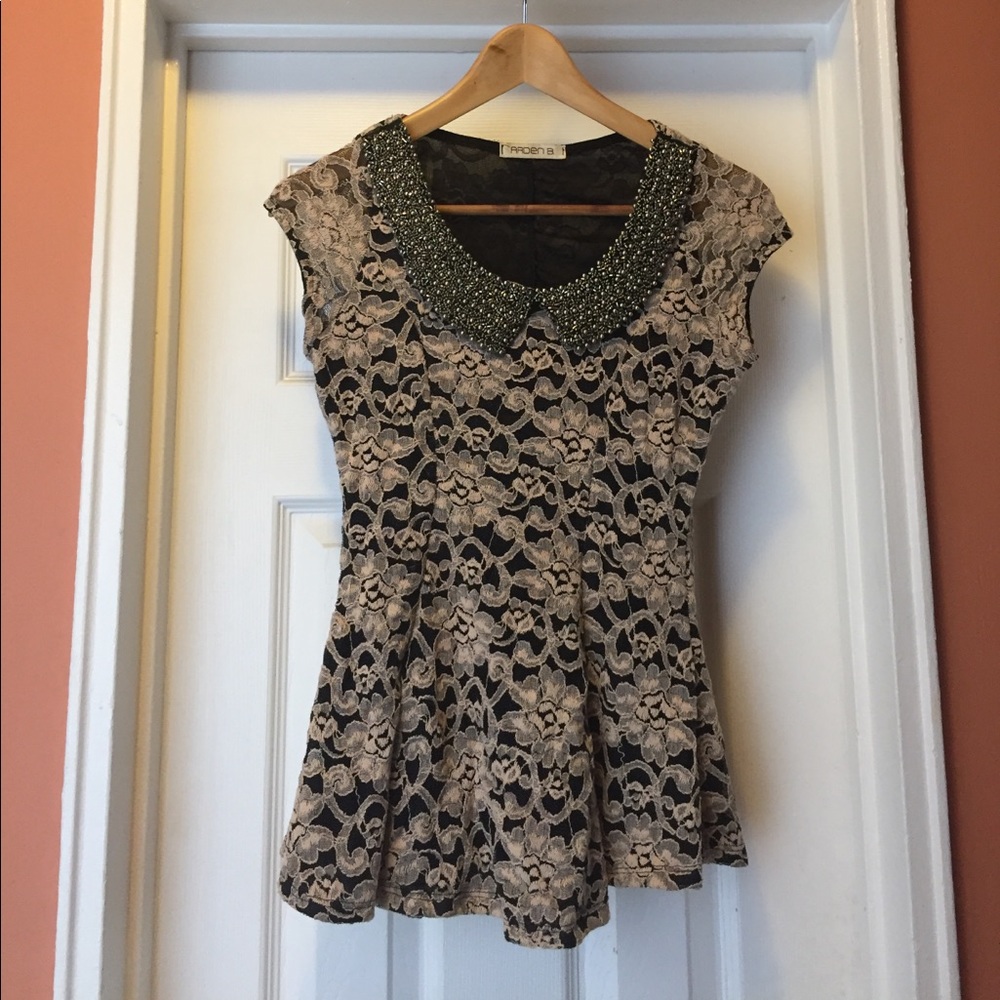 Nude and black lace cap sleeve shirt
