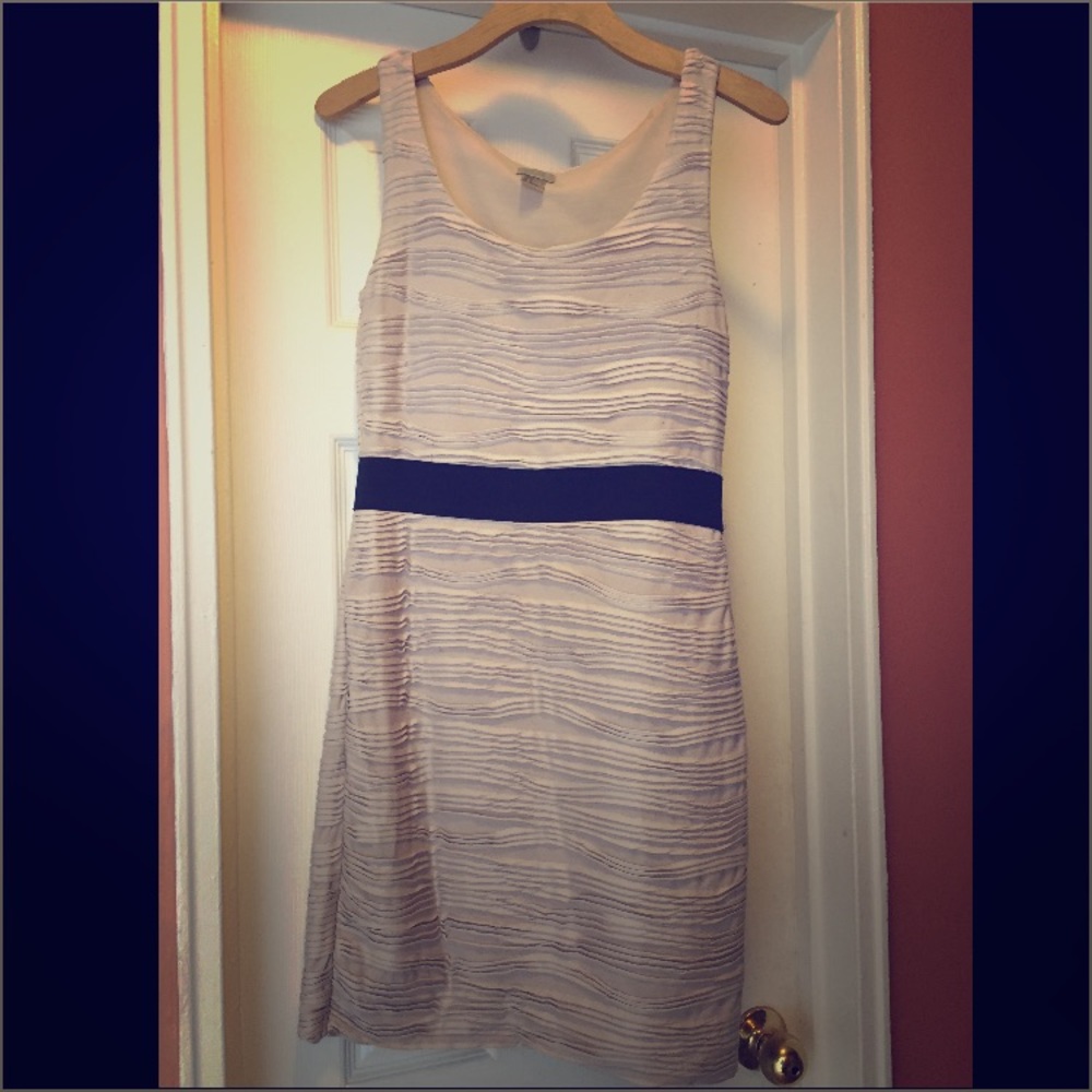 Nude, sleeveless fitted shift