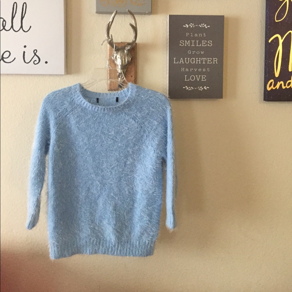 Fuzzy  feathered sweater