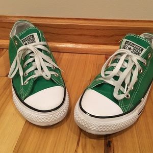Kelly Green Converse gym shoes.