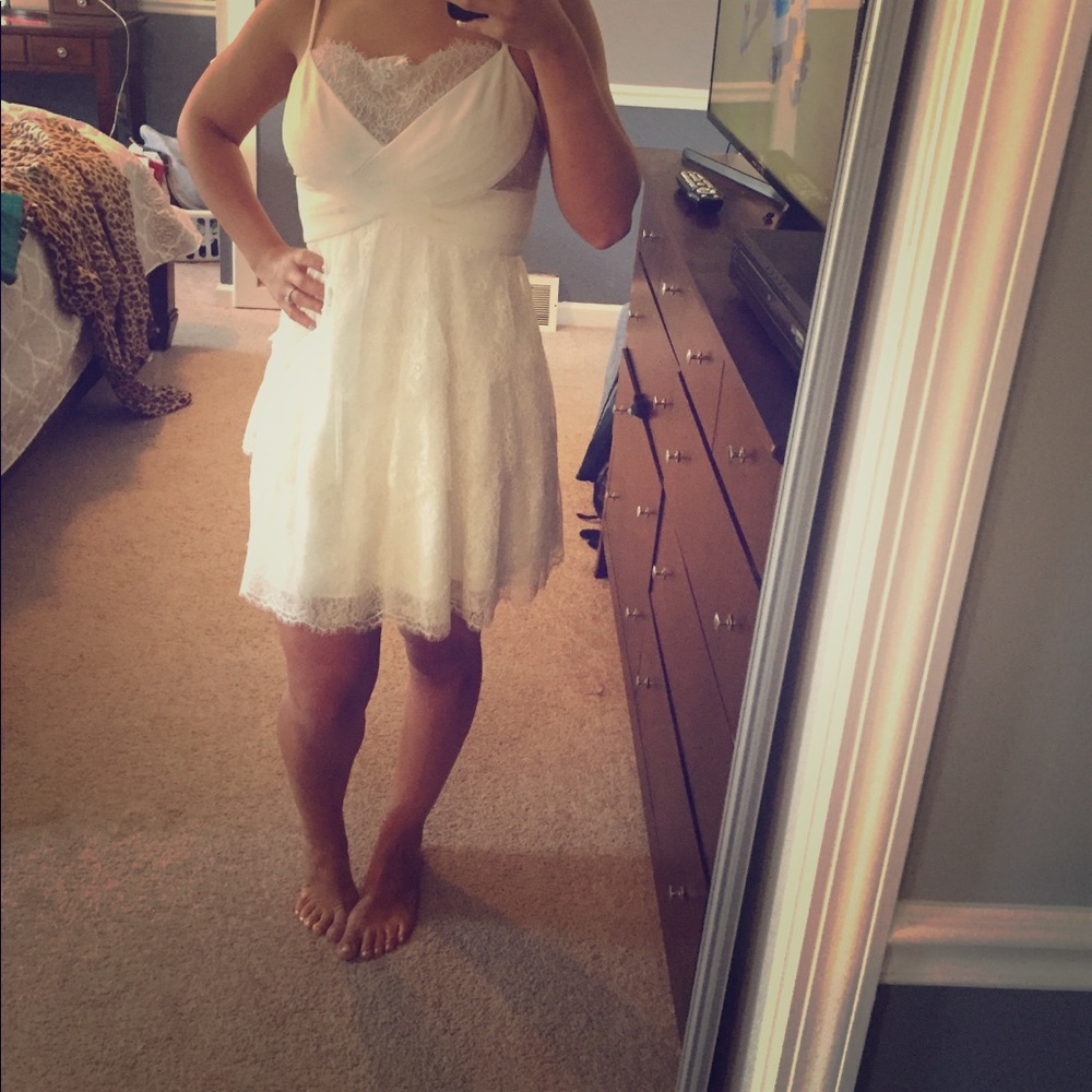 White ruffled BCBG dress.