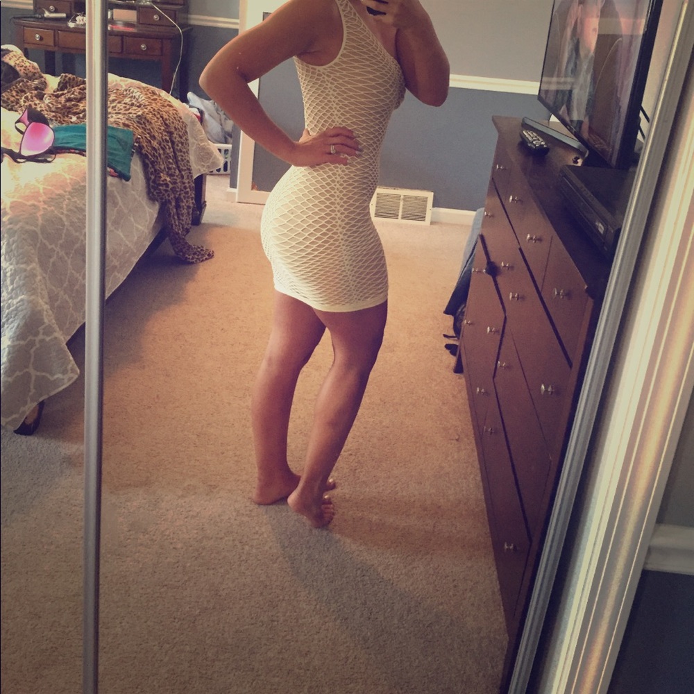 One shoulder BeBe dress.