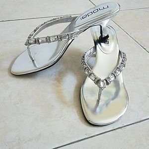 Kitten heels....  silver.