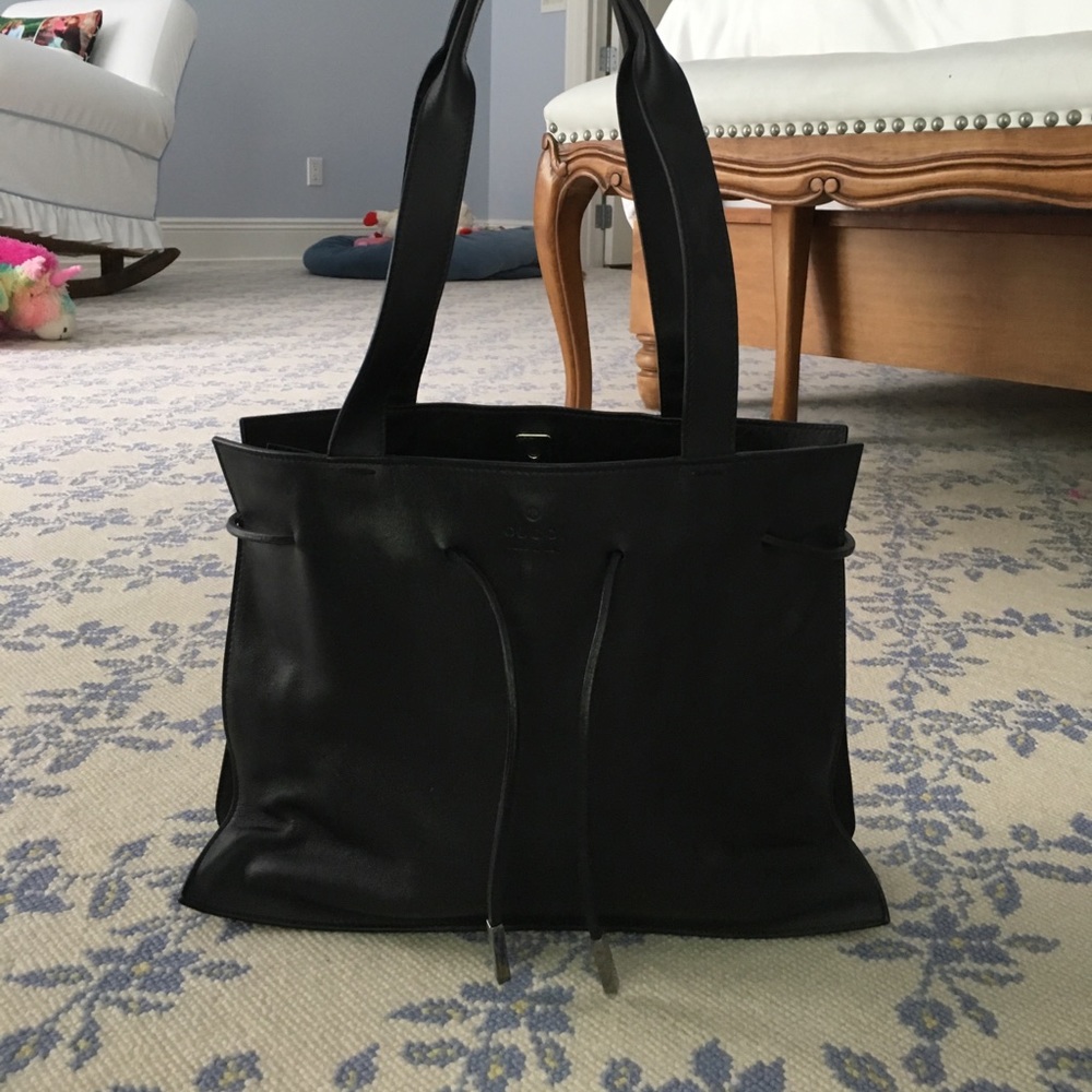 Gucci black leather bag never been worn