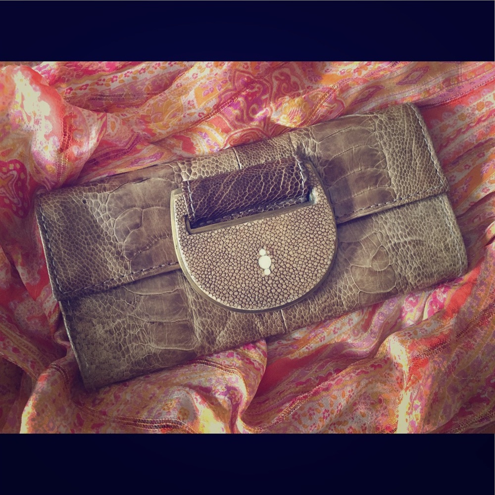 Snakeskin clutch with stingray buckle