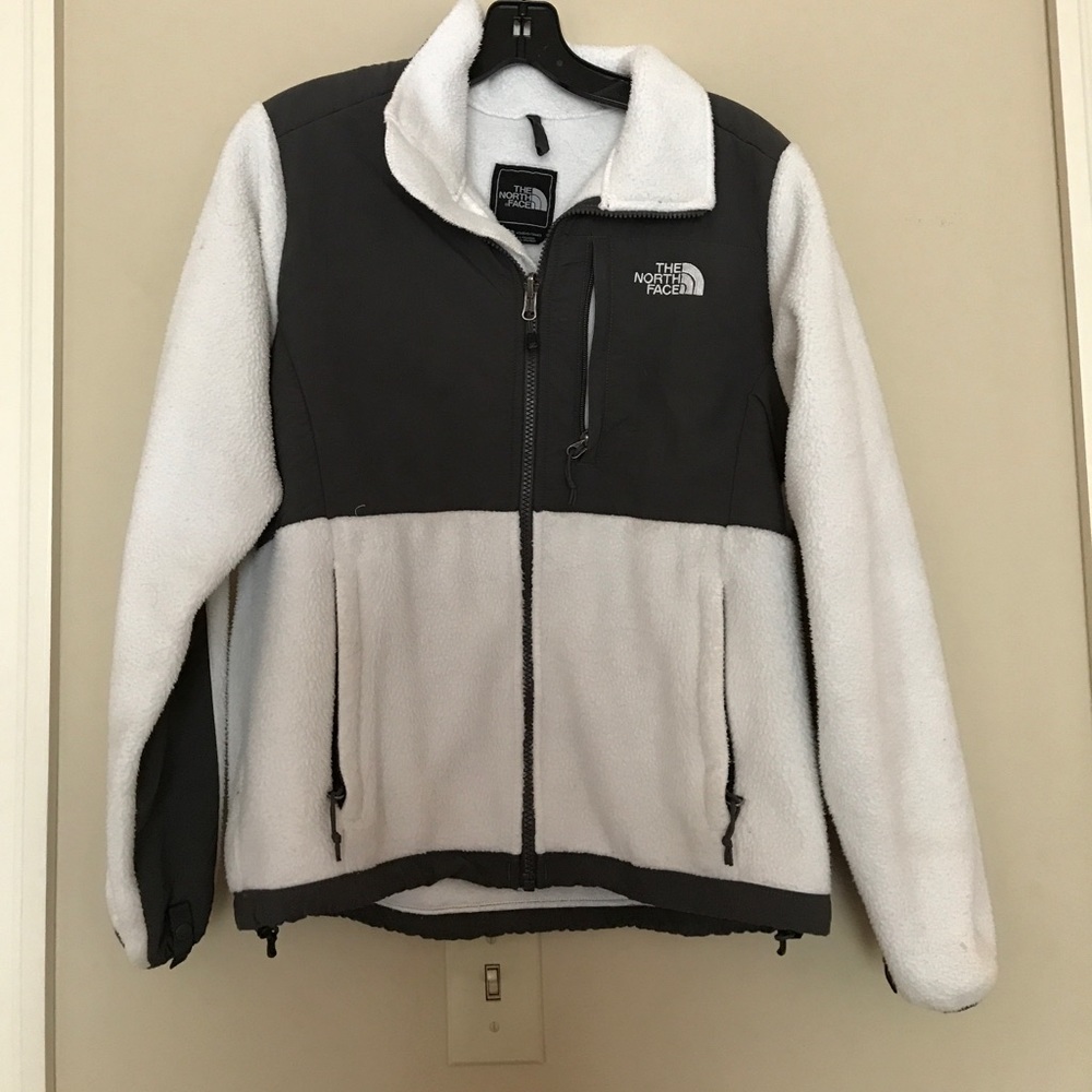 White and gray north face jacket