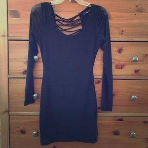Sheer long sleeve short black dress.