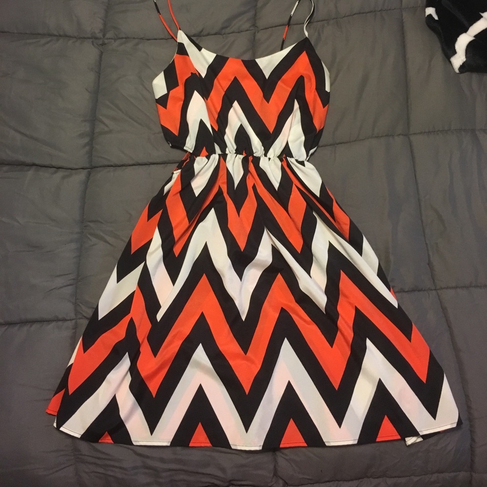 Orange, white, and blk chevron dress with cut outs