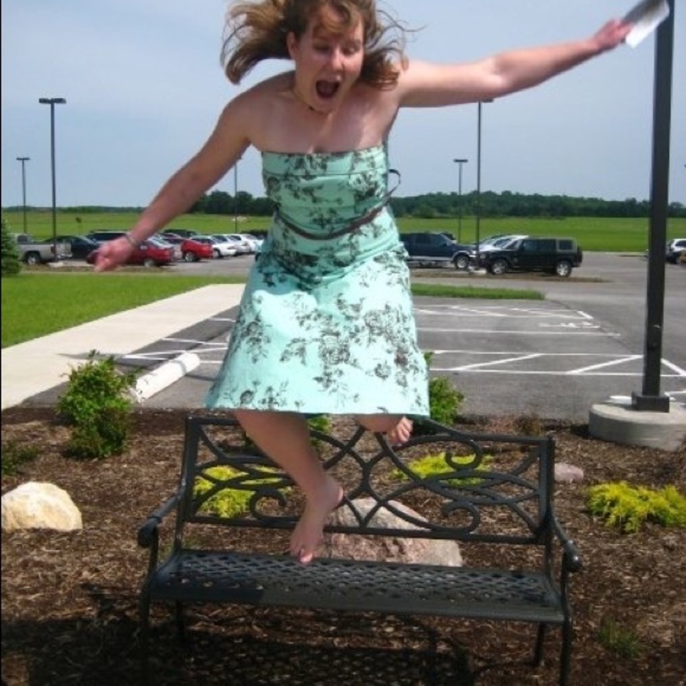 Mint dress with brown flowers.