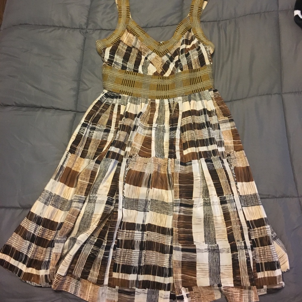 Brown printed dress with a splash of color
