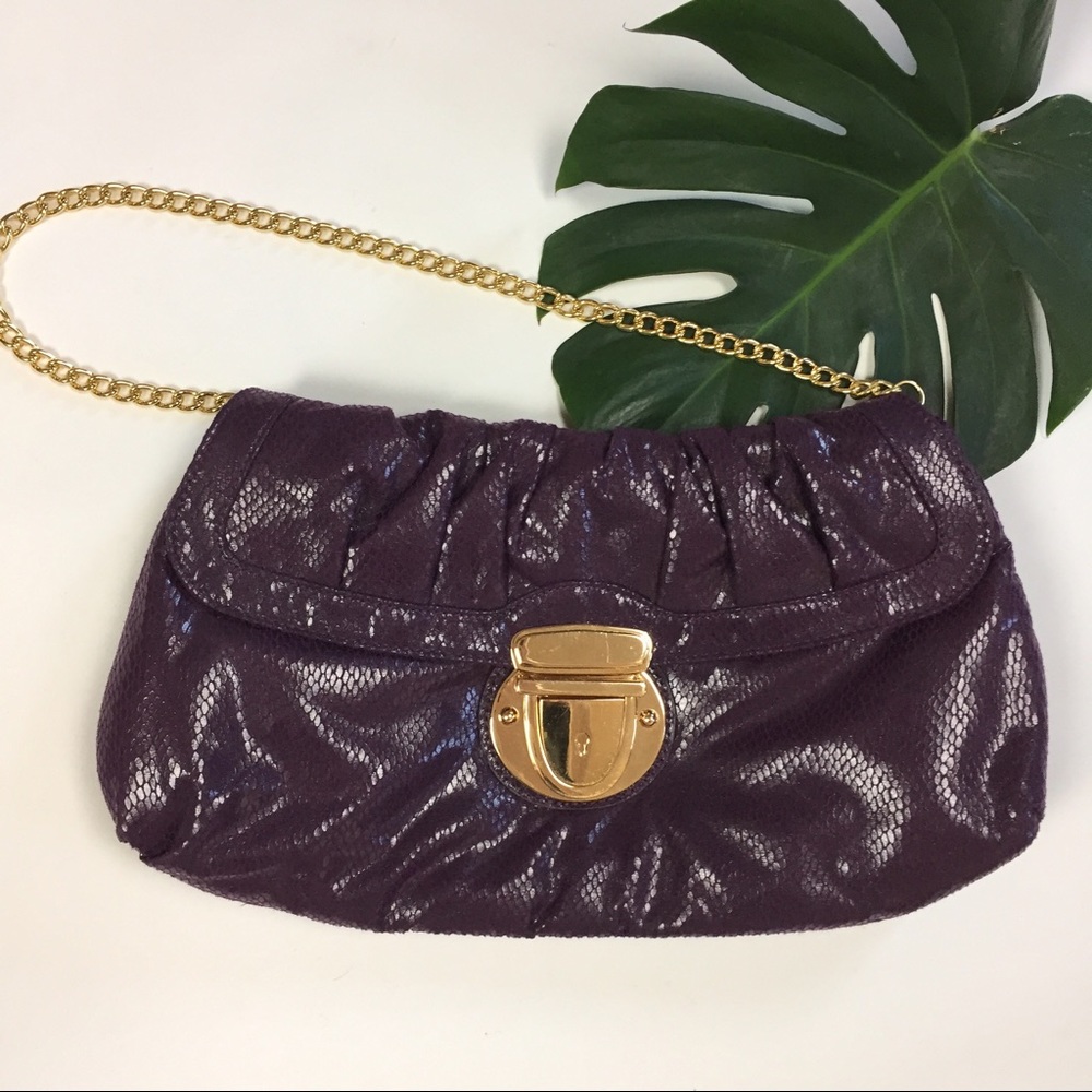 Kristin Davis purple shoulder bag or clutch