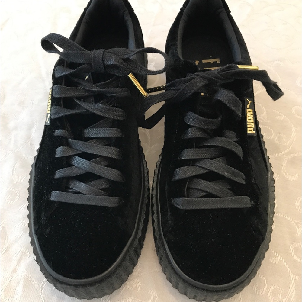Puma Black Shoes. Worn only once. Size 7.5  $100.