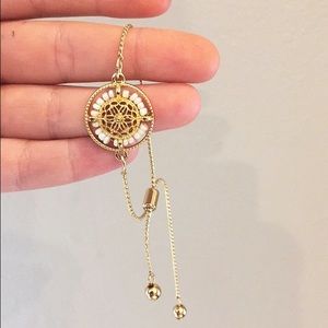 Gold/ white bracelet