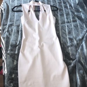 Light pink fitted dress.