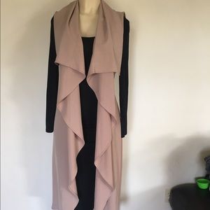 Long tan vest ( only have 2 left in large)