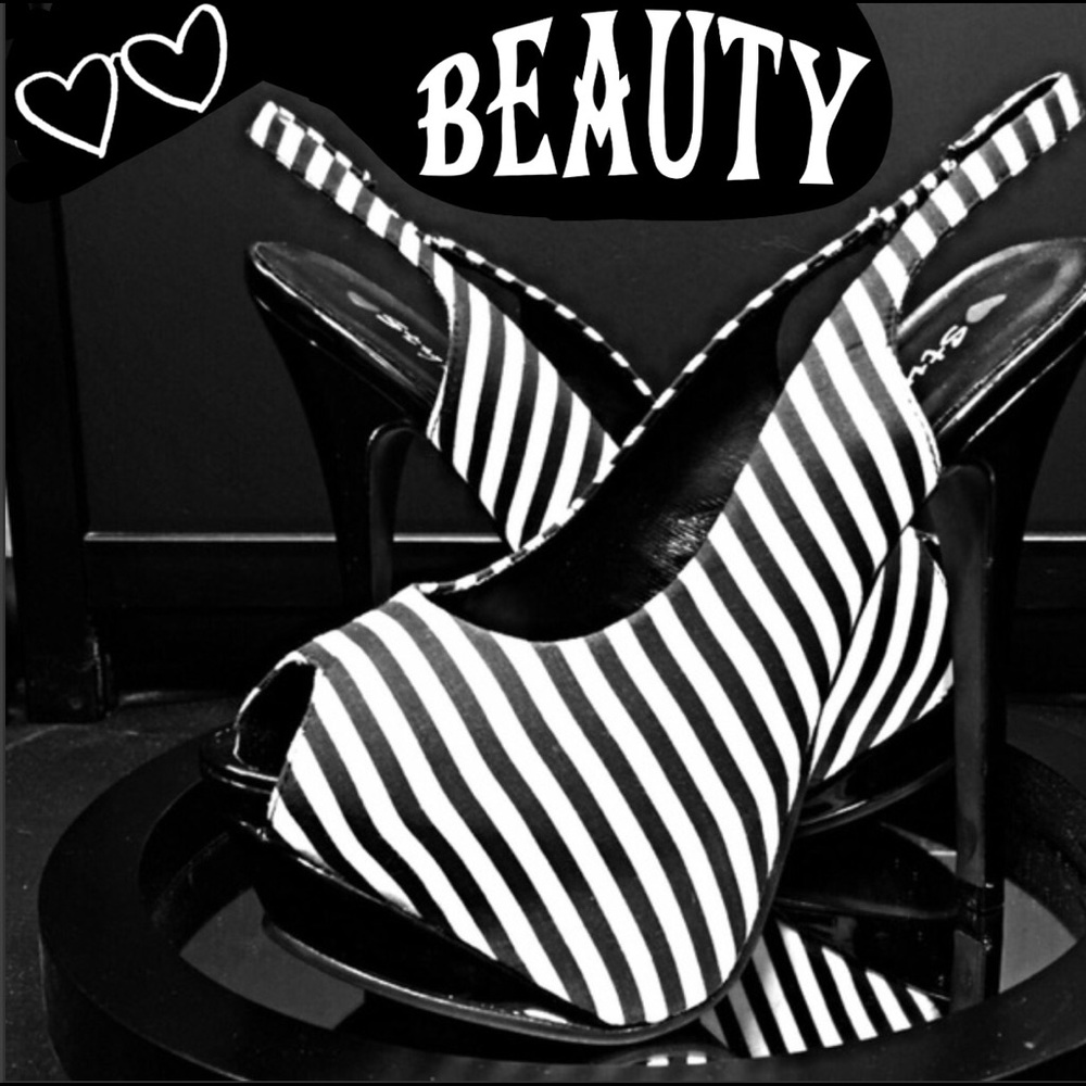 Super cute gently used black & white sling backs