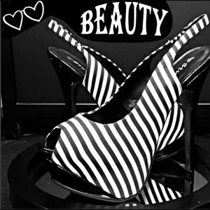 Super cute gently used black & white sling backs