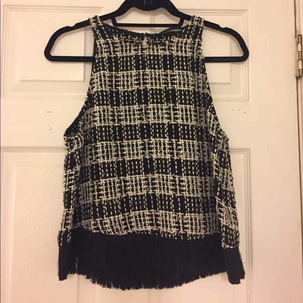 Black and white woven top with fringe detail