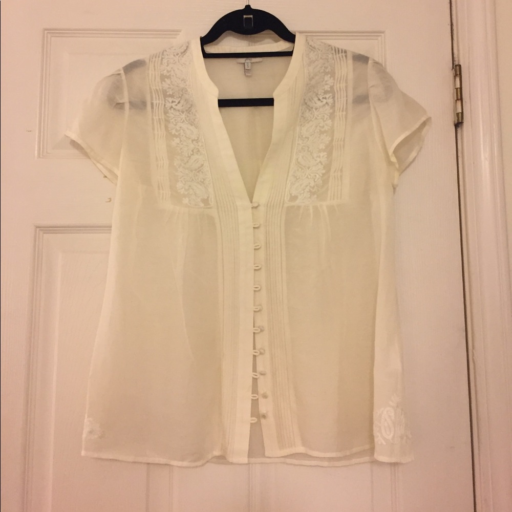 Delicate off-white v-neck blouse