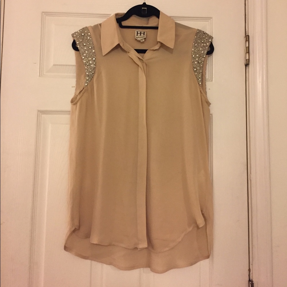 Beige silk blouse with sequin detail around arms