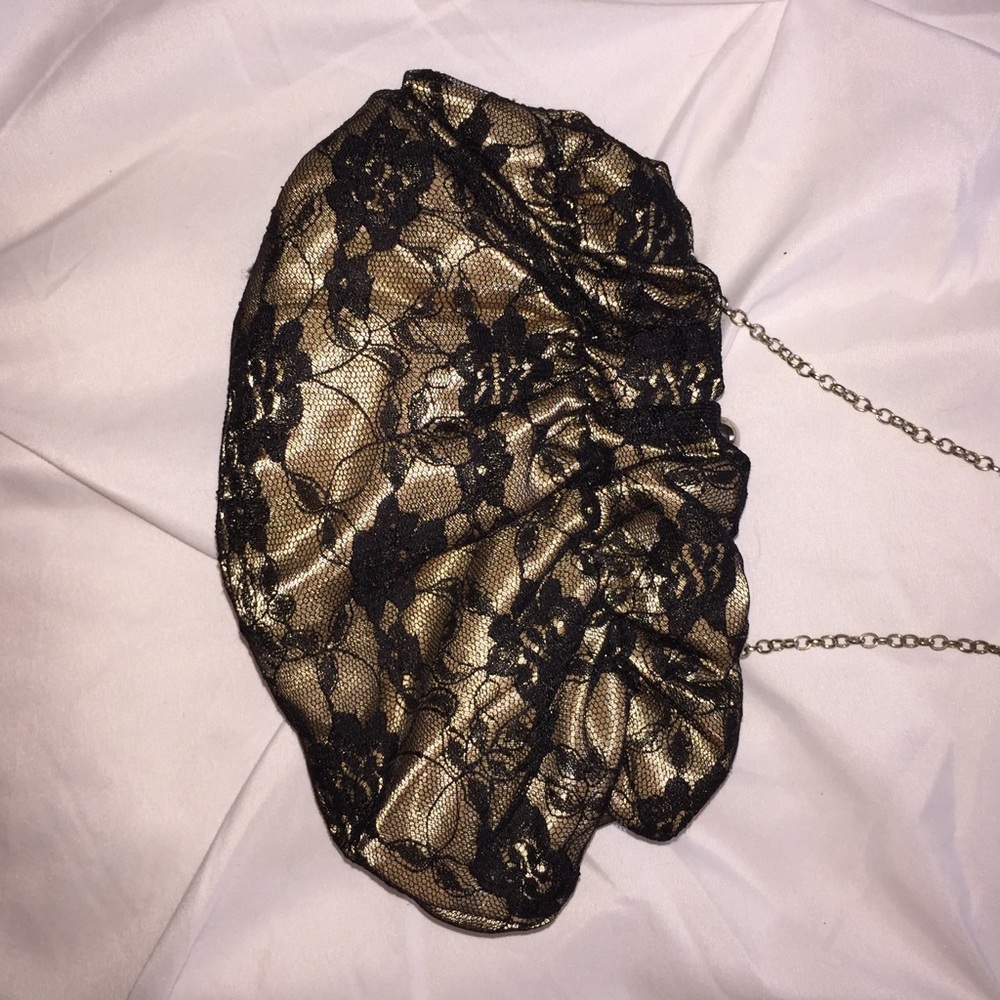 Black/ tan lace clutch