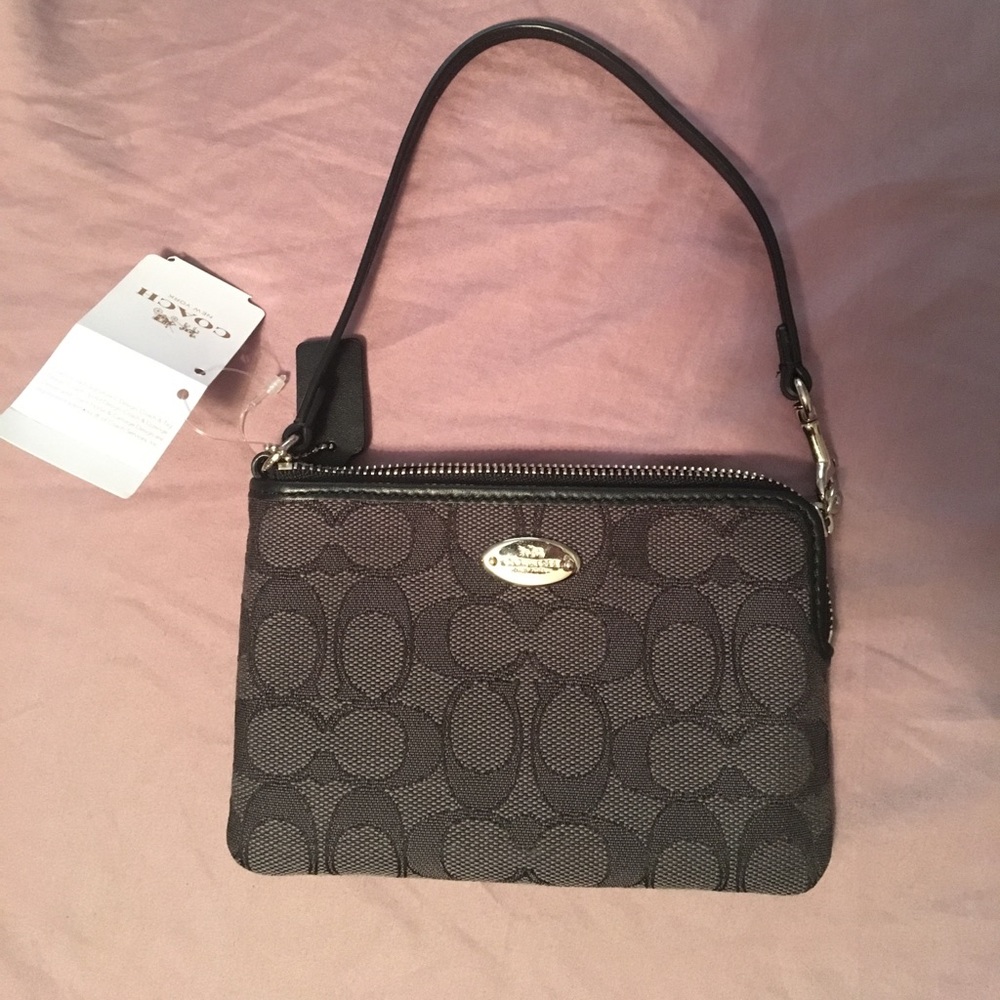 Black, Coach wristlet.
