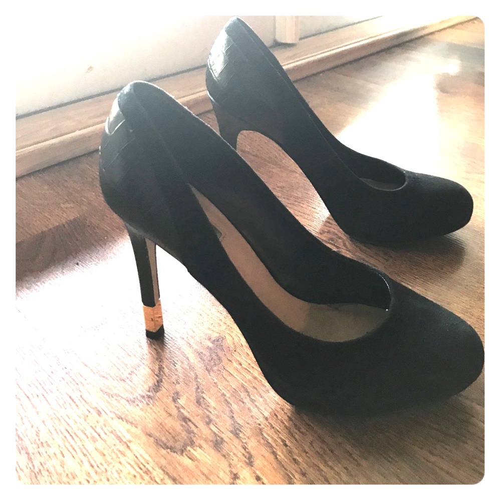 Black suede heels with leather and gold details