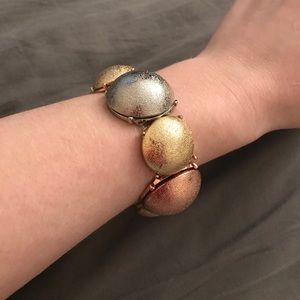Stretchy gold, rose gold and silver bracelet