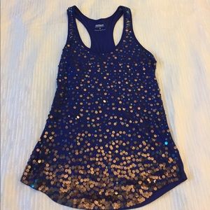Express tank top with sequence on the front.