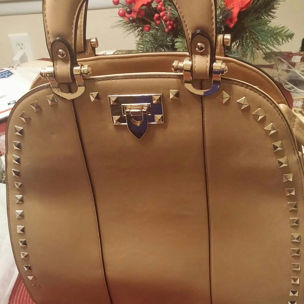 Studded p/u leather handbag
