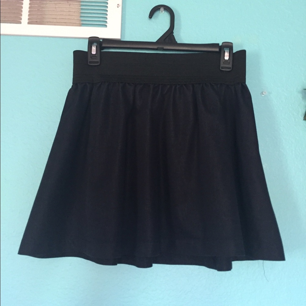 Miley Cyrus dark wash skirt