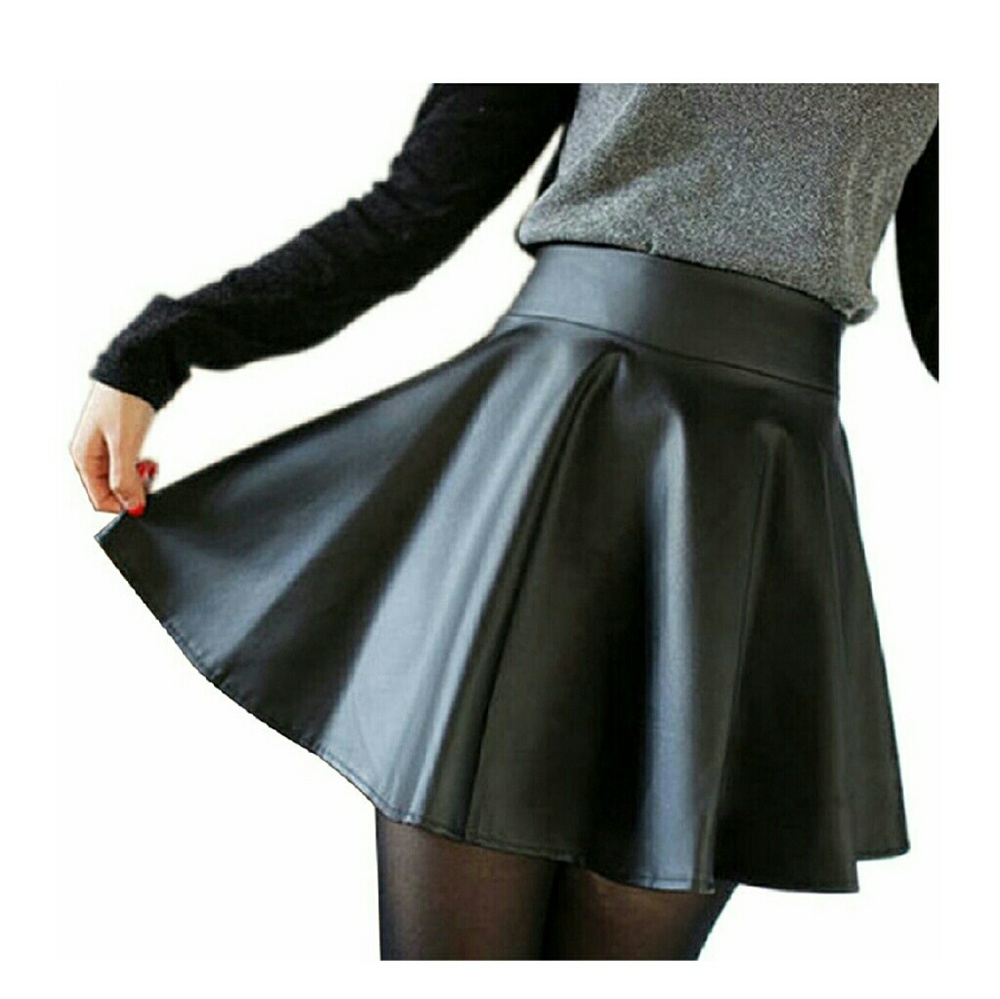 High waisted leather pleated shirt.