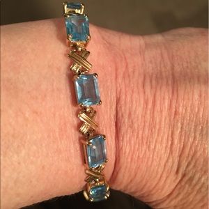 10kt YG Blue Topaz Tennis bracelet.