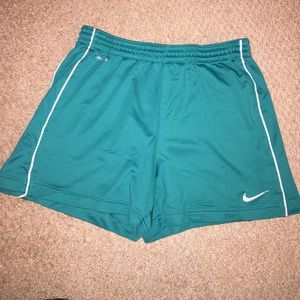 Nike Dry-Fit soccer shorts.