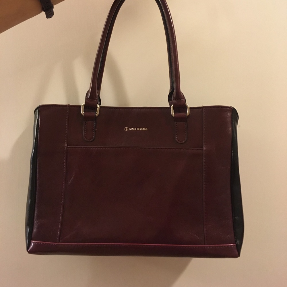 Maroon and black purse