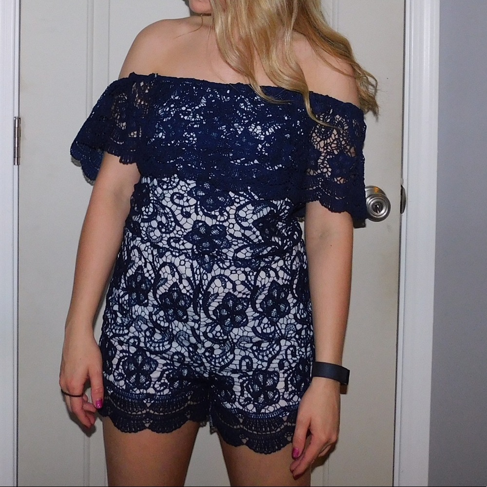 Navy blue romper (off shoulder sit)