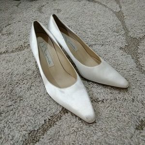 White satin pumps