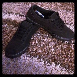 All Black VANS - women's size 7