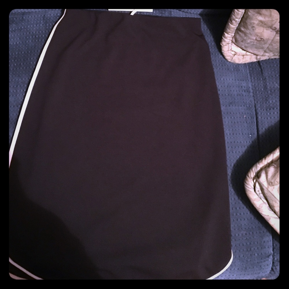 Black mid length pencil skirt.