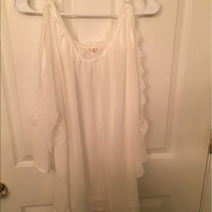 Beautiful Lacey/fringe blouse.